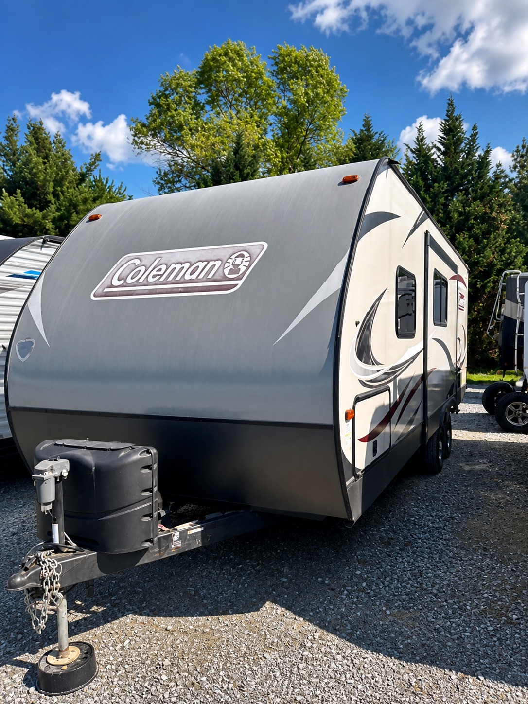 Polished exterior photo of the 2019 Coleman Light travel trailer